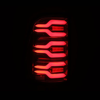 AlphaRex 19-21 Dodge Ram 1500 Luxx-Series LED Tail Lights Black/Red w/Activ Light/Seq