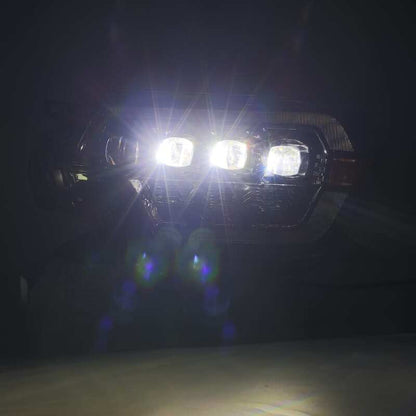 AlphaRex 12-15 Toyota Tacoma NOVA LED Proj Headlights Plank Style Black w/Activ Light/Seq